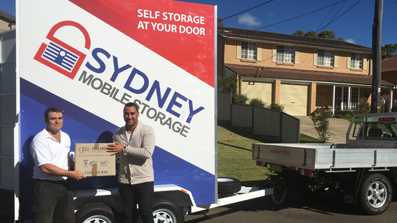 Two Men Packing Their Mobile Self Storage In Sydney
